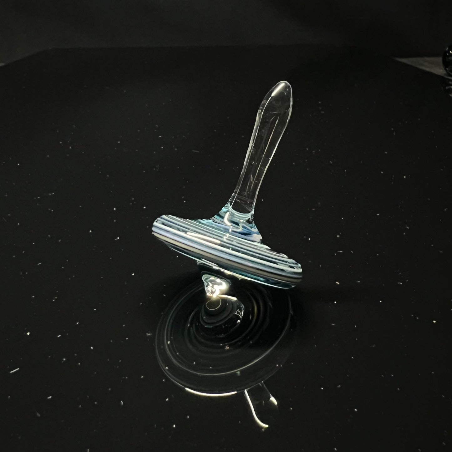 UV Spinning Top